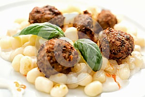 Gnocchi with meat sauce and cheese