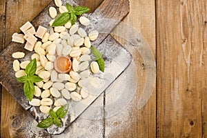 Gnocchi with potatoes. Traditional italian food from Rome, Sardinia, south of italy. Homemade gnocchi with parmesan, egg