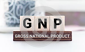 GNP Gross National Product sign on colorful wooden cubes