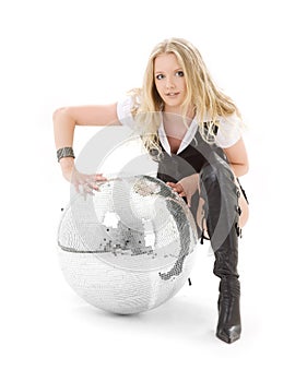 Go-go dancer in high boots with disco ball
