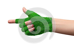 Go Green ConceptHand in glove grass indicates the direction.