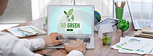 Go green for environmental awareness concept display on laptop. Trailblazing