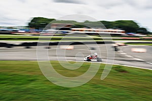 Go Kart  driving training  racing in provocative style.Panning images and motion blur