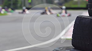 Go karts racing increase speed in race track