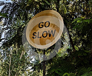 Go Slow traffic sign in a residential area