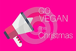 Go Vegan This Christmas message on a pink background with a megaphone