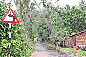 Goa greens and mosoon roads and traffic sign