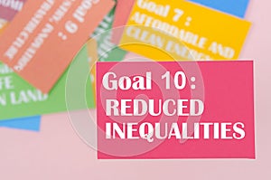 The Goal 10 : Reduced Inequalities. The SDGs 17 development goals environment. Environment Development concepts