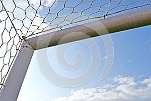 Goal Corner. Soccer or Football goal corner with net sky blue