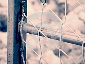 Goal  gate with net and snow at side line