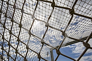 The goal net against blue sky during team practice in Thessaloni