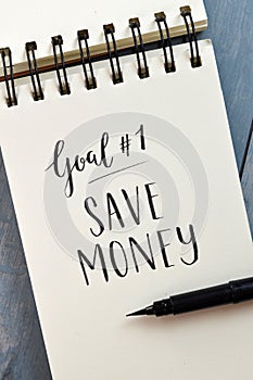 Goal No. 1 SAVE MONEY hand-lettered in notepad