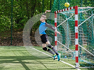 Goalkeeper catches the ball. Stadium goalie sports play ground game, grass soccer keeper man, outdoorsc ompetition,