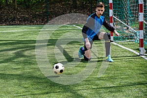 Goalkeeper catches the ball. Stadium goalie sports play ground game, grass soccer keeper man, outdoorsc ompetition,