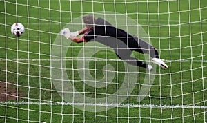 Goalkeeper diving save