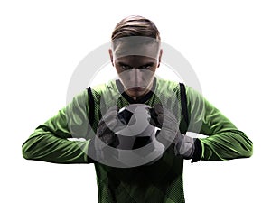 Goalkeeper in green ready to save on white background