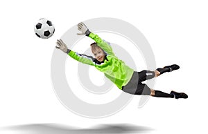 Goalkeeper kid flying for the ball on white