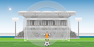 Goalkeeper prepares to take a penalty kick on the gate