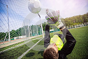 Goalkeeper soccer man didnt catch ball after penalty