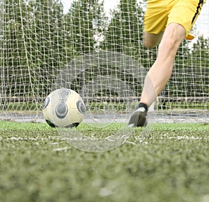 Goalkeeper in the yellow shorts