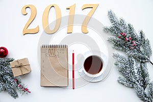 Goals for new year in blank open notebook top view