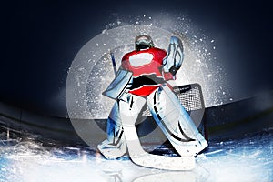 Goaltender at hockey arena in searchlight rays photo