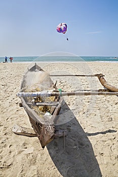 Goan fishing boat bathers and paragliders photo