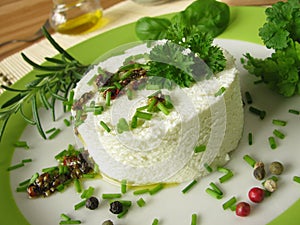 Goat cream cheese with herb marinade