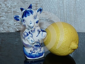 The goat and lemon yellow. According to the Eastern calendar, the goat is included in the 12 animals of Chinese mythology.