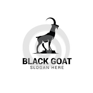 Goat standing on rock logo template