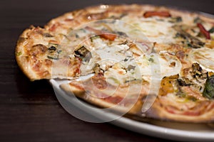 Goats cheese and roasted vegatable pizza