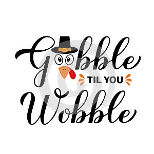 Gobble til you wobble calligraphy hand lettering. Funny Thanksgiving quote. Vector template for greeting card photo