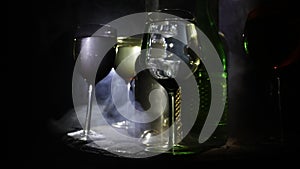 Goblet of white wine on wooden table on wooden wall background