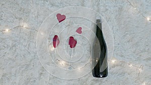Goblets With bottle of champagne and red heart