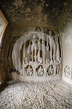 God budha hand-made scriptures on walls in historic and centuries old kanheri caves in mumbai, India