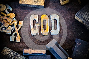 God Concept Wood and Rusted Metal Letters