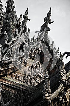 God goddess wood sculpture statue, exterior architecture, Sanctuary of Truth, Thailand