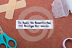 God heals brokenhearted and bandages their wounds, a handwritten text note