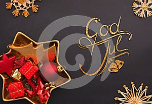 God Jul, Scandinavian Merry Christmas with golden and red Christmas decoration