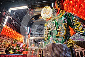 God statue in traditional old oriental chinese temple in Taiwan