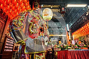 God statue in traditional old oriental chinese temple in Taiwan