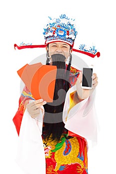 God of wealth holding red envelope and mobile phone.