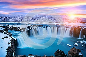 Godafoss waterfall at sunset in winter, Iceland photo