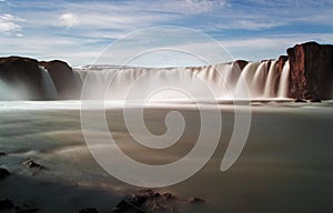 Godafoss waterfalls with mountain photo
