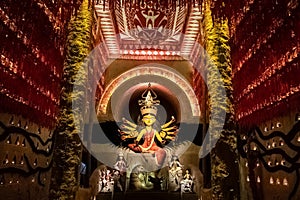 Goddess Durga devi idol decorated at puja pandal in Kolkata, West Bengal, India. Durga Puja is the biggest religious festival of