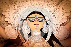 Goddess Durga Face in Happy Durga Puja Subh Navratri Maa background