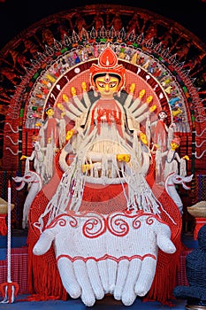 Goddess Durga idol decorated at puja pandal in Kolkata, West Bengal, India. Durga Puja is biggest religious festival of Hinduism