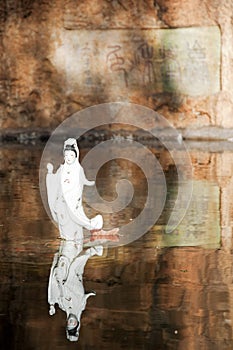 Goddess Guanyin Statue with reflection