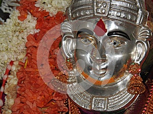 Goddess Lakshmi Statue Decoration using flower and gold jewellery during festival of Vara Mahalakshmi Festival. Varalakshmi Vratam