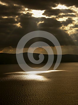 Gods rays and boats on the sea